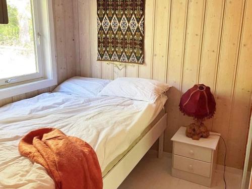 Katil atau katil-katil dalam bilik di Holiday home Svelgen V