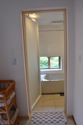 Postel nebo postele na pokoji v ubytování Auberge Fujii Fermier