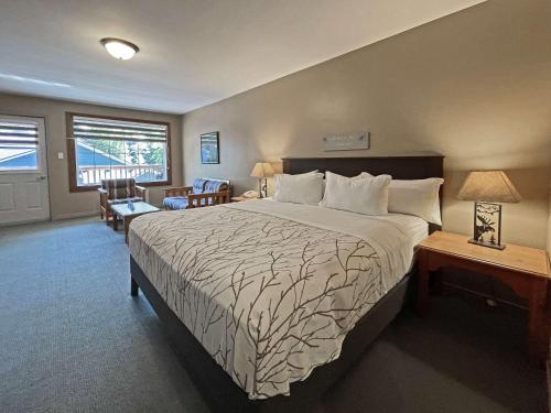 Кровать или кровати в номере The Grand Tappattoo Resort, Ascend Hotel Collection