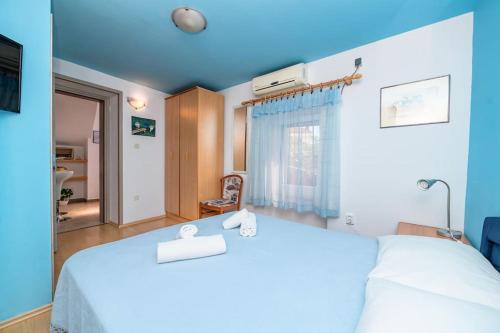 Postel nebo postele na pokoji v ubytování Bozena