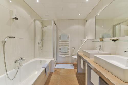 Ванная комната в Hotel Bergheim