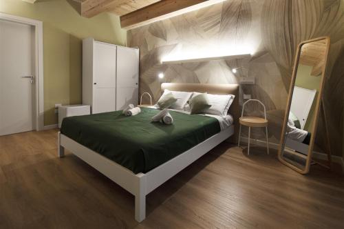 Ένα ή περισσότερα κρεβάτια σε δωμάτιο στο B&b Porta Arpana
