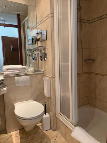 Ένα μπάνιο στο Private Suite im Gebäude des Graf Eberhard Hotels