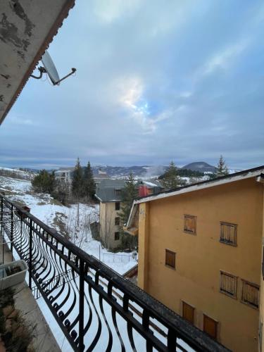 a view from the balcony of a building with snow on the ground at Casetta Rivisondoli con Garage gratuito in Rivisondoli