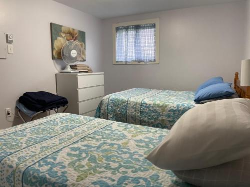 Postel nebo postele na pokoji v ubytování Rivers End Motel
