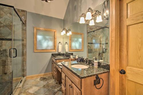 a bathroom with a sink and a shower at Luxe Wintergreen Resort Escape with Hot Tub! in Roseland