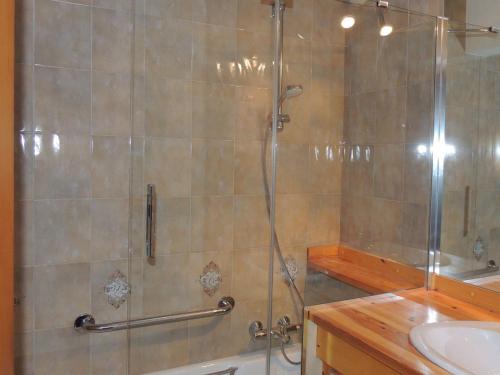 a bathroom with a shower with a glass door at Appartement Les Gets, 3 pièces, 5 personnes - FR-1-598-73 in Les Gets