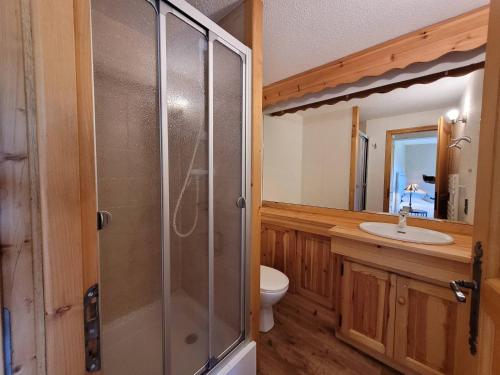 a bathroom with a shower and a toilet and a sink at Appartement de Luxe 6 Pièces Pied des Pistes au Centre du Village - Les Gets - FR-1-598-26 in Les Gets