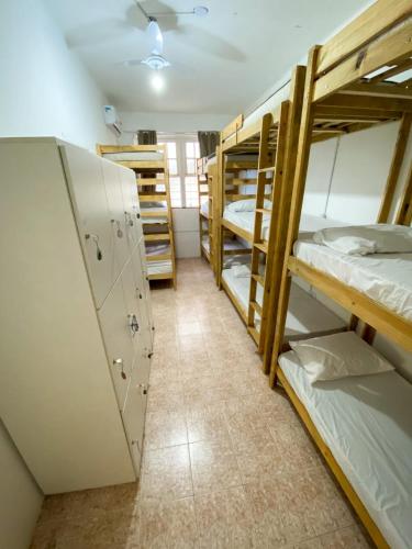 Ένα ή περισσότερα κρεβάτια σε δωμάτιο στο Hostel Sol da Barra