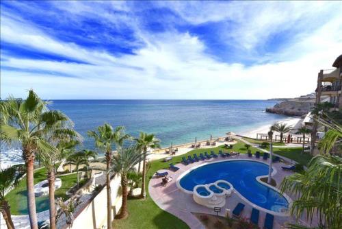 a view of the ocean from the balcony of a resort at Sub- Penthouse Las Olas Surfers Paradise in San José del Cabo