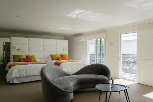 Кровать или кровати в номере Casa Hidalgo Hotel Boutique
