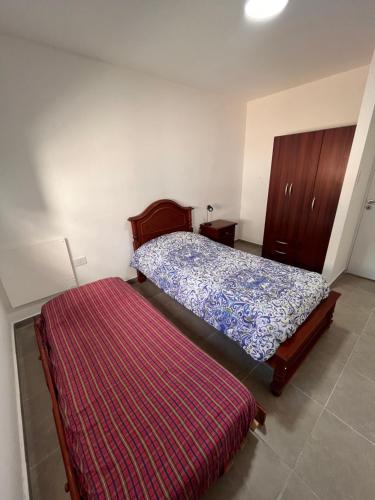 Postel nebo postele na pokoji v ubytování Departamento Nº 3 en complejo semiprivado! 2 habitaciones