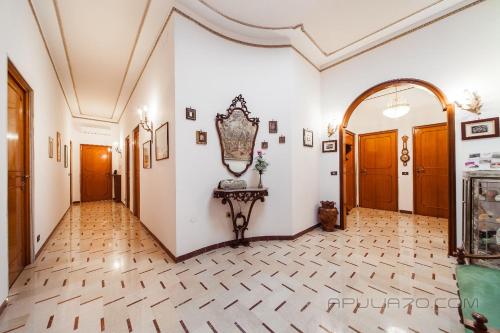 Postel nebo postele na pokoji v ubytování Apulia 70 Holidays - Suites & Experiences