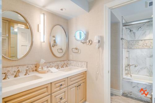a bathroom with a sink and a shower at Beach House Steps from Balboa Ferry in Newport Beach
