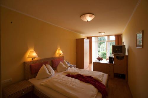 
Ein Bett oder Betten in einem Zimmer der Unterkunft Berner Haus
