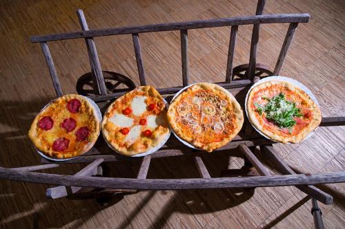 a group of pizzas sitting on top of a rack at Ferien beim Treiber in Bad Tatzmannsdorf
