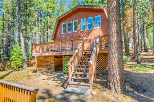 a house in the woods with a staircase leading up to it at Sierra Nevada Serenity in South Lake Tahoe