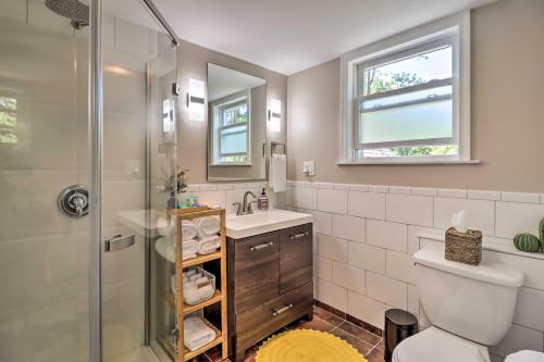 a bathroom with a shower and a toilet and a sink at Pocono Mountain Escape with Game Room Walk to Lake! in Albrightsville
