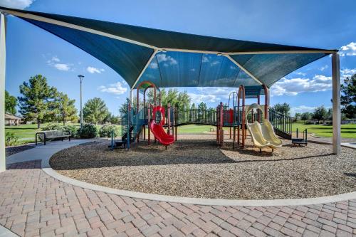 a park with a playground with a slide at Avondale Getaway Less Than 8 Mi to Estrella Mountain! in Avondale