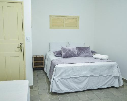 Een bed of bedden in een kamer bij Beach Point Barra Grande