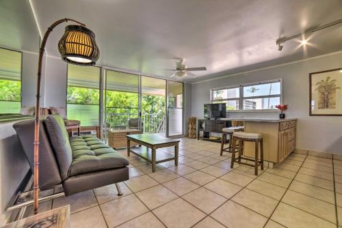 a living room with a couch and a table at Beautiful Kihei Condo - Walk to the Beach! in Kihei