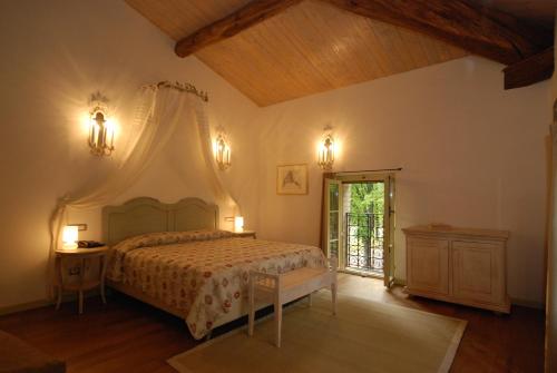 เตียงในห้องที่ Locanda Del Re Guerriero