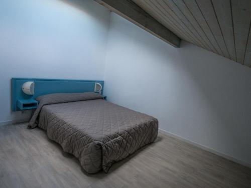 מיטה או מיטות בחדר ב-Résidence Mer & Golf Fort Socoa