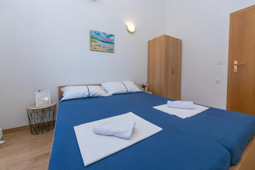 Katil atau katil-katil dalam bilik di Apartment Podaca 6677b