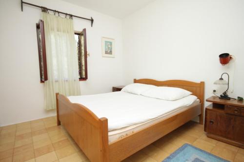 Postel nebo postele na pokoji v ubytování Seaside holiday house Verunic, Dugi otok - 8126