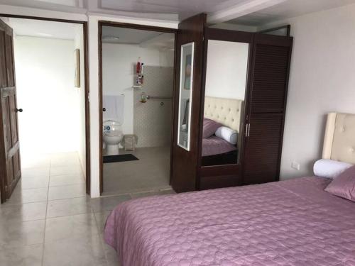 Voodi või voodid majutusasutuse Casa Panorámica con Jacuzzi balcon. Familia Amigos toas