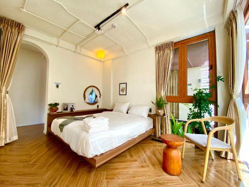Katil atau katil-katil dalam bilik di Teakhouse Đà Lạt