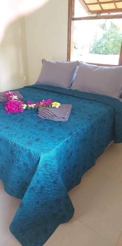 Postel nebo postele na pokoji v ubytování Rangiroa Guest Paradise