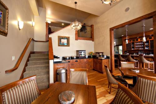 a dining room with wooden tables and chairs at Hotel Elliott in Astoria, Oregon