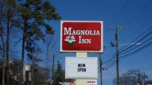 a sign for a margarita firm on a street at Magnolia Inn Laurens in Laurens