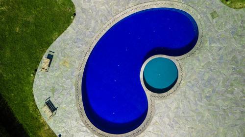 an overhead view of a blue circle in a field at Korta Escape- A Heritage Resort in Jawai in Korta