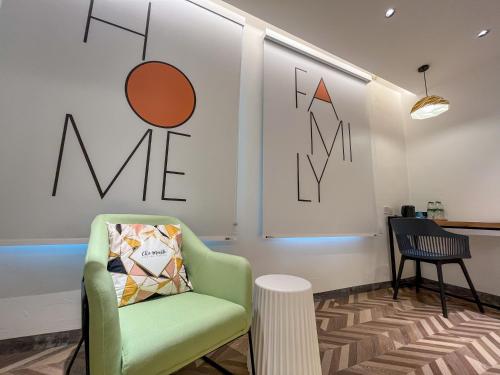 Un lugar para sentarse en Apple 1 Hotel Queensbay