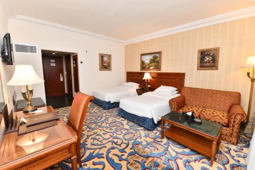 Katil atau katil-katil dalam bilik di Casablanca Hotel Jeddah