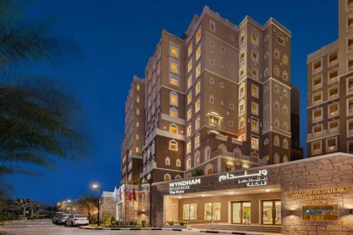a rendering of the hampton inn suites hotel at Wyndham Residences The Palm in Dubai
