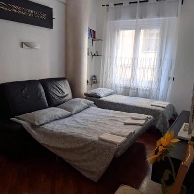Un pat sau paturi într-o cameră la Leo! Intero appartamento ad uso ESCLUSIVO - Aeroporto Genova Sestri Ponente