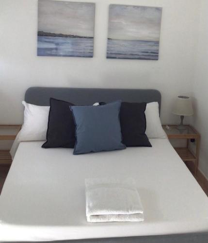 Ένα ή περισσότερα κρεβάτια σε δωμάτιο στο Ostia Bed and Beach