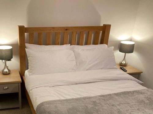 Ліжко або ліжка в номері Bee Cottage
