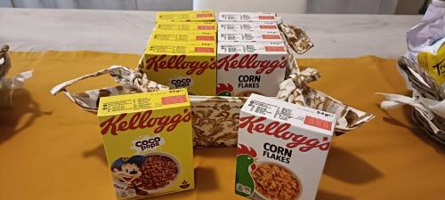 two boxes of validated grain mixes sitting on a table at Appartamento Beatrice in Villanova dʼAsti