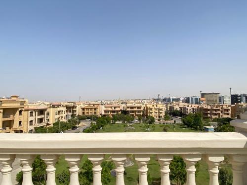 a view of a city from a balcony at Chelay studios in Cairo