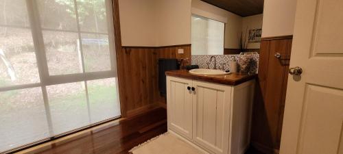 A kitchen or kitchenette at Tall Trees Eco Retreat