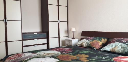 Postel nebo postele na pokoji v ubytování Vakantiewoning EvaLisa