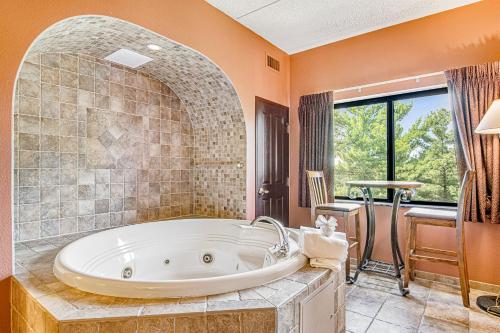 a bathroom with a large tub in a room at Chula Vista Condo Unit 2645 in Wisconsin Dells