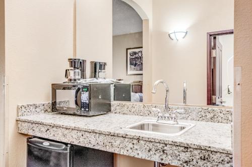a kitchen with a sink and a microwave at Chula Vista Condo Unit 2647 in Wisconsin Dells