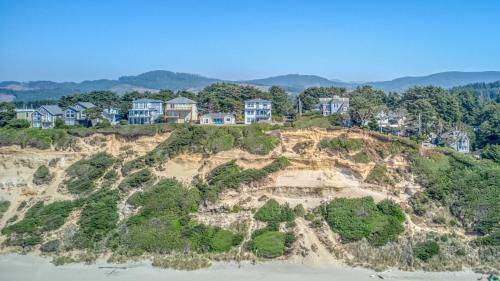 an aerial view of a house on top of a hill at Lincoln Landing in Lincoln City