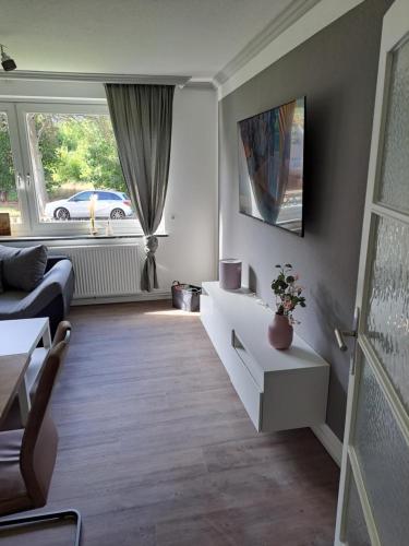 Ferienwohnung Carlos 1 und 2にあるテレビまたはエンターテインメントセンター