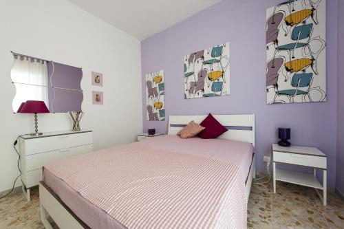 En eller flere senge i et værelse på Casa Vacanze Circe